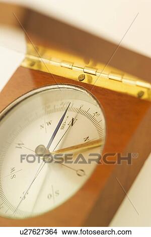 Closeup of a compass View Large Photo Image Picture - Closeup of a compass. Fotosearch