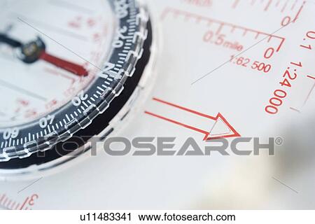 Stock Image - Closeup of a compass. Fotosearch