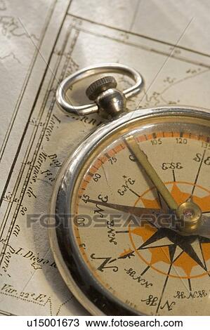 Stock Image - Closeup of a compass. Fotosearch
