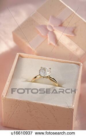 Stock Photo - Closeup of a diamond engagement ring. Fotosearch