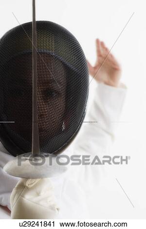 Stock Image - Closeup of a fencer. Fotosearch