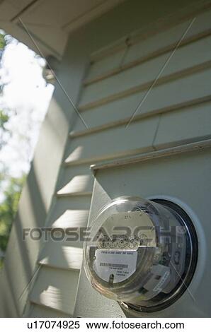 Stock Photography - Closeup of a home electric meter. Fotosearch