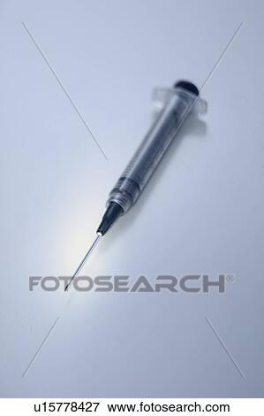 Stock Photo - Closeup of a hypodermic needle. Fotosearch
