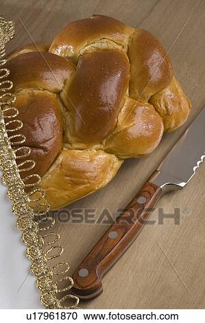 Closeup of a loaf of challah bread View Large Photo Image Stock Image - Closeup of a loaf of challah bread. Fotosearch
