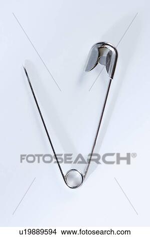 Picture - Closeup of a safety pin. Fotosearch