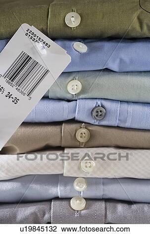 Closeup of a stack of dress shirts View Large Photo Image Stock Image - Closeup of a stack of dress shirts. Fotosearch