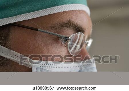 Stock Photo - Closeup of a surgeon. Fotosearch