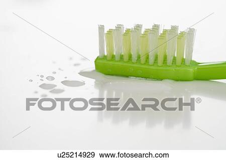 Stock Photo - Closeup of a toothbrush. Fotosearch