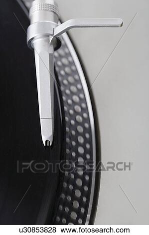 Stock Photo - Closeup of a turntable and record. Fotosearch