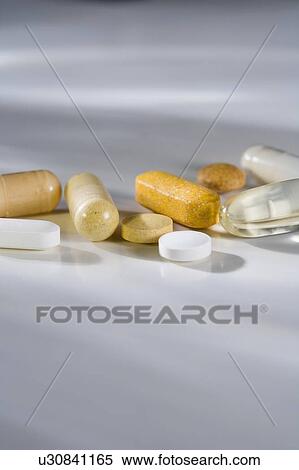 Closeup of a variety of pills View Large Photo Image Stock Photography - Closeup of a variety of pills. Fotosearch