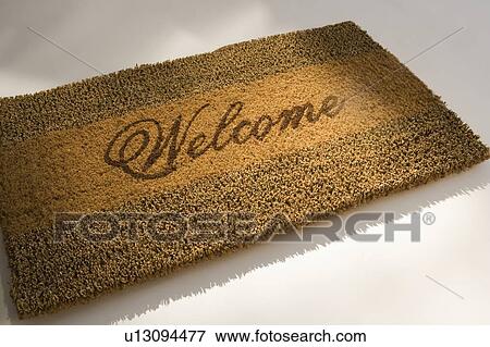 Closeup of a welcome mat View Large Photo Image Stock Photo - Closeup of a welcome mat. Fotosearch