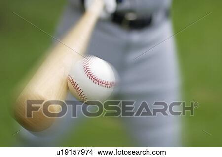 Closeup of baseball player hitting ball View Large Photo Image Picture - Closeup of baseball player hitting ball. Fotosearch