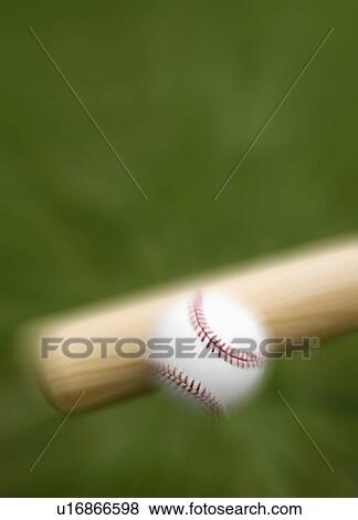 Closeup of bat hitting baseball View Large Photo Image Stock Photo - Closeup of bat hitting baseball. Fotosearch