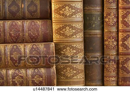Stock Image - Closeup of beautifully bound books. Fotosearch
