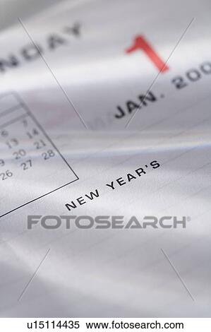 Stock Photography - Closeup of calendar page for new year. Fotosearch
