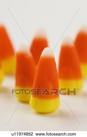 Stock Image - Closeup of candy corn. Fotosearch