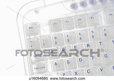 Stock Photography - Closeup of corner of transparent keyboard. Fotosearch
