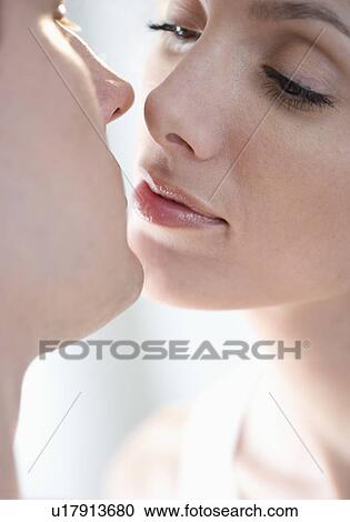 Closeup of couple kissing View Large Photo Image Stock Image - Closeup of couple kissing. Fotosearch