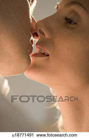 Closeup of couple kissing View Large Photo Image Stock Image - Closeup of couple kissing. Fotosearch