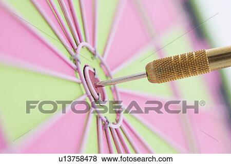 Closeup of dart in bulls eye View Large Photo Image Stock Photo - Closeup of dart in bulls eye. Fotosearch