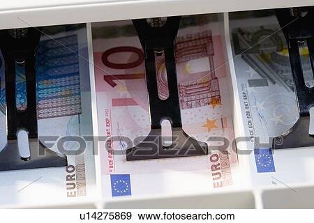 Closeup of Euros in cash register View Large Photo Image Stock Photo - Closeup of Euros in cash register. Fotosearch