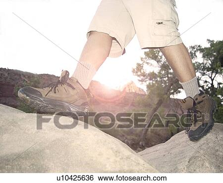 Closeup of feet hiking View Large Photo Image Stock Photograph - Closeup of feet hiking. Fotosearch