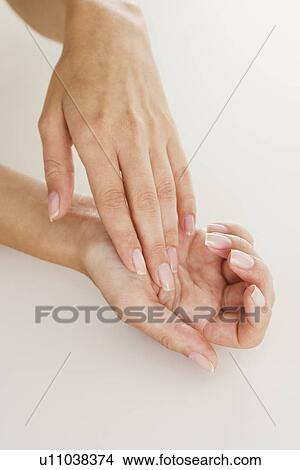 Picture - Closeup of female hands. Fotosearch