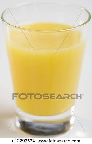 Closeup of glass of orange juice View Large Photo Image Picture - Closeup of glass of orange juice. Fotosearch