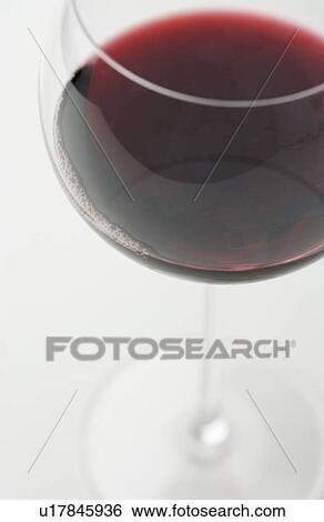 Closeup of glass of red wine View Large Photo Image Stock Photograph - Closeup of glass of red wine. Fotosearch