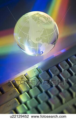 Closeup of globe and keyboard View Large Photo Image Stock Image - Closeup of globe and keyboard. Fotosearch