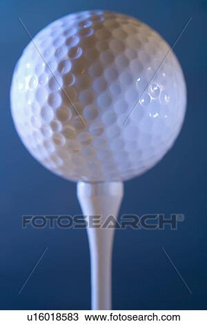 Closeup of golf ball on tee View Large Photo Image Stock Image - Closeup of golf ball on tee. Fotosearch