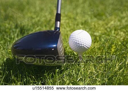 Stock Photography - Closeup of golf ball teed up for play. Fotosearch