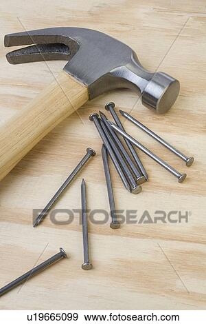 Closeup of hammer and nails View Large Photo Image Stock Photo - Closeup of hammer and nails. Fotosearch