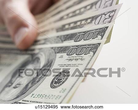 Closeup of hand with American cash View Large Photo Image Stock Photography - Closeup of hand with American cash. Fotosearch