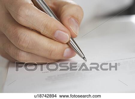 Closeup of hand writing with pen View Large Photo Image Picture - Closeup of hand writing with pen. Fotosearch