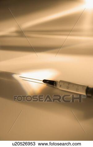 Stock Image - Closeup of hypodermic needle. Fotosearch