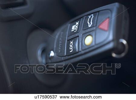 Closeup of key in car ignition View Large Photo Image Stock Photo - Closeup of key in car ignition. Fotosearch