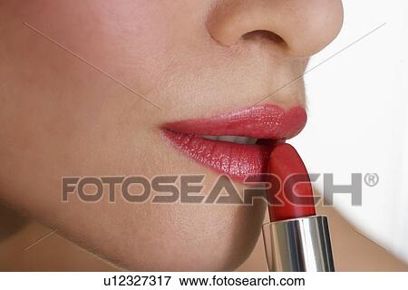 Closeup of mouth with red lipstick View Large Photo Image Stock Photo - Closeup of mouth with red lipstick. Fotosearch
