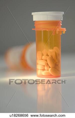 Closeup of prescription pill bottles View Large Photo Image Stock Photograph - Closeup of prescription pill bottles. Fotosearch