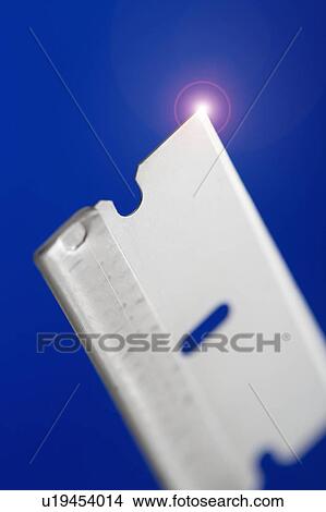 Picture - Closeup of razor blade. Fotosearch