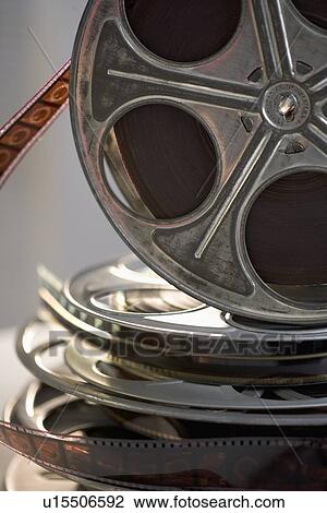 Stock Image - Closeup of stack of film reels. Fotosearch
