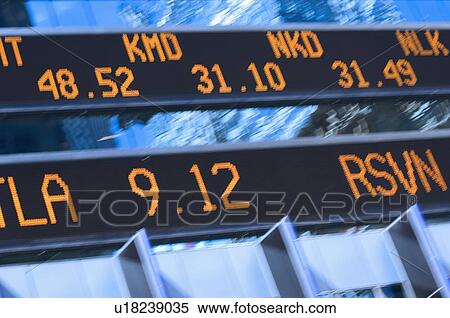 Stock Photography - Closeup of stock market ticker. Fotosearch