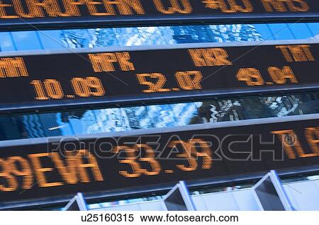 Stock Photography - Closeup of stock market ticker. Fotosearch