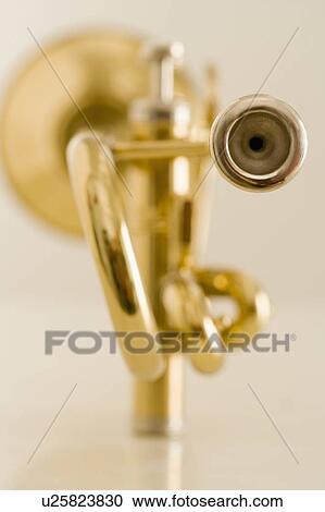 Stock Image - Closeup of trumpet mouthpiece. Fotosearch