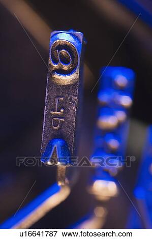Stock Photo - Closeup of typewriter printing plates. Fotosearch