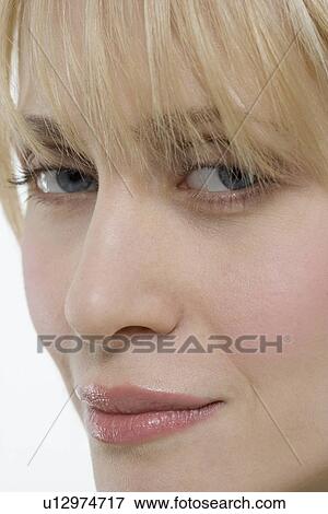 Closeup of woman looking sideways View Large Photo Image Stock Photo - Closeup of woman looking sideways. Fotosearch