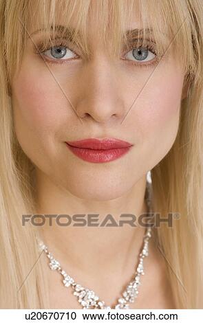 Closeup of woman wearing necklace View Large Photo Image Stock Image - Closeup of woman wearing necklace. Fotosearch