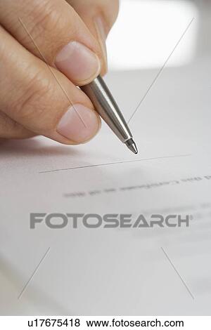 Closeup up of fingers with pen View Large Photo Image Stock Photo - Closeup up of fingers with pen. Fotosearch