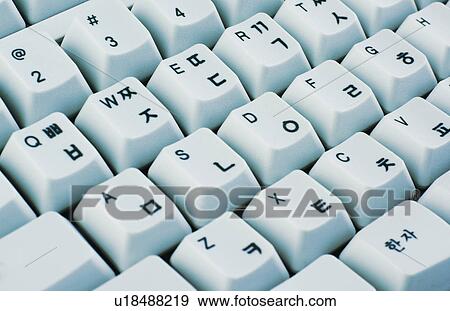 Stock Photo - Computer keyboard with English letters and Korean characters. Fotosearch