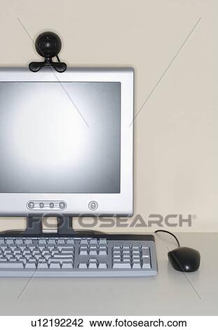Stock Image - Computer with webcam attachment. Fotosearch